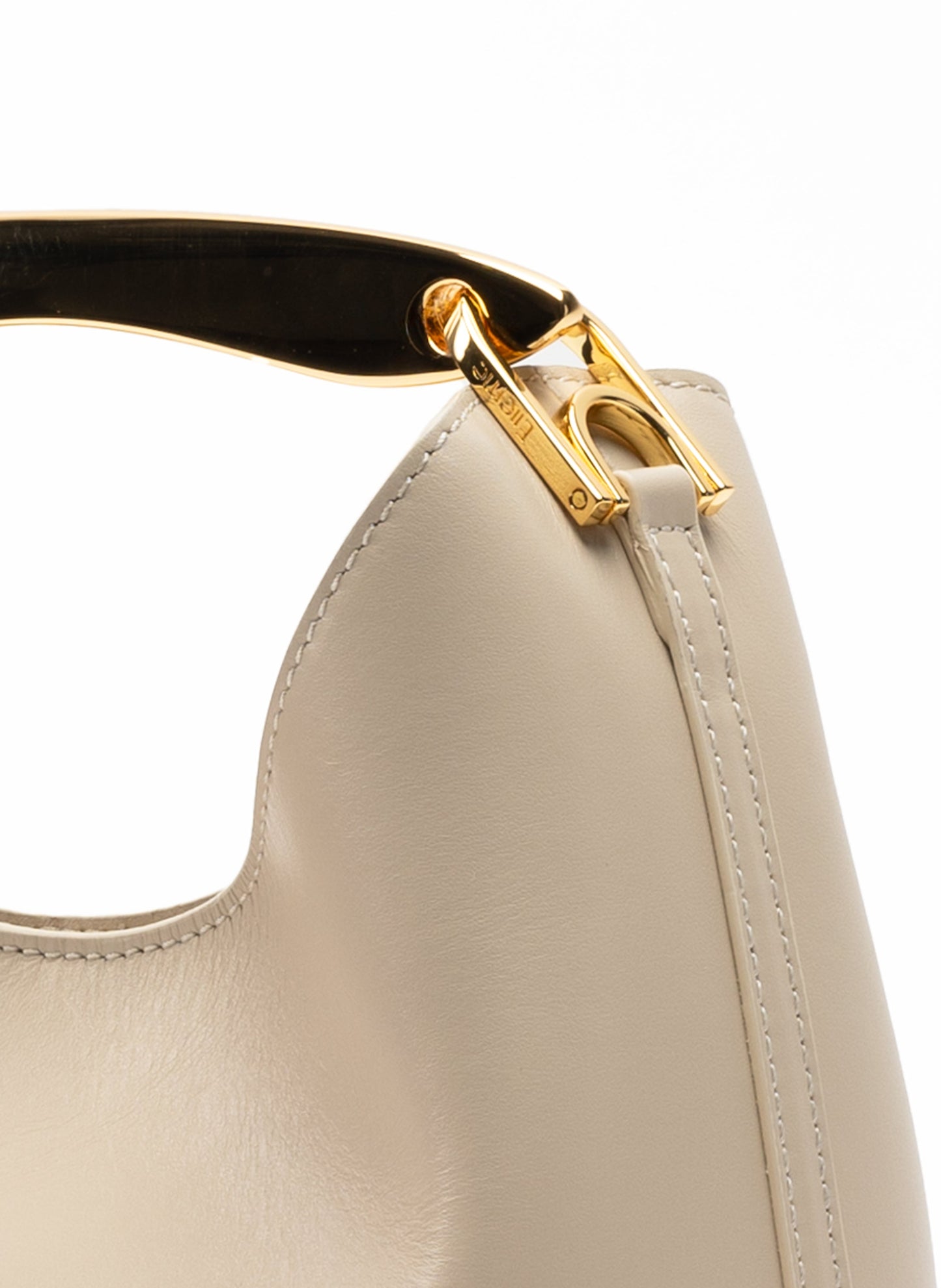 Small Boomerang Leather Sesame